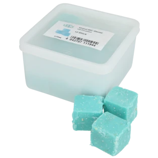 Urinal cakes with enzymes